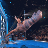 Dinosaur Dance Swinging On Pole GIF