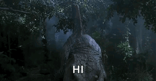 Dinosaur In Forest Saying Hi GIF