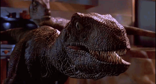 Dinosaur Standing On Kitchen Counter GIF