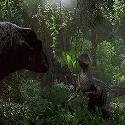 Dinosaurs Standing In Green Forest GIF