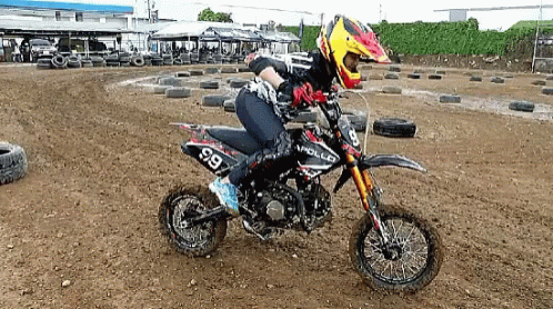 Lady Having Trouble Starting Dirt Bike GIF