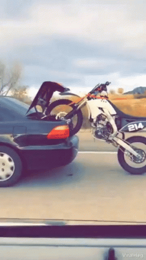 Dirt Bike Piggyback Riding On Car GIF