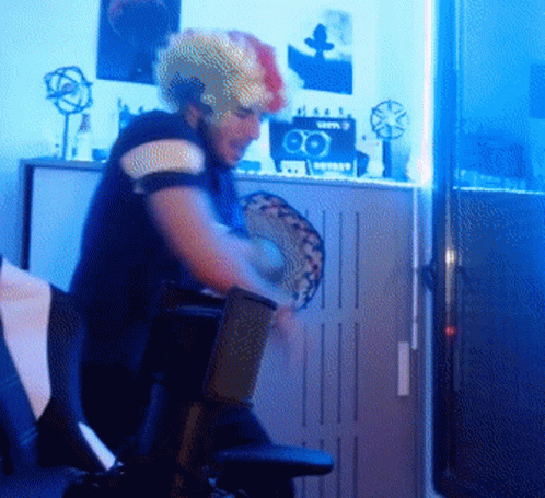 Disco Dancing Man Wearing Colorful Wig GIF