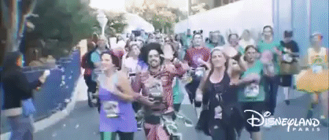Disney Land Ladies Crossing Finish Line GIF