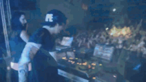 DJ Playing Music for Crowd at Concert