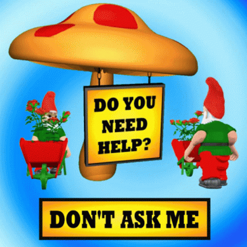 Do You Need Help Sign Above Gnome in Wheelbarrow