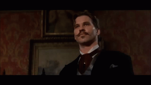 Doc Holliday Juggling Glass GIF