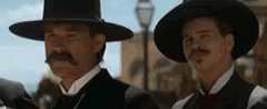 Doc Holliday Val Kilmer Kurt Russell Wyatt Earp GIF