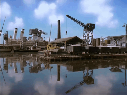Dock with Boats, Crane, and Building Reflection
