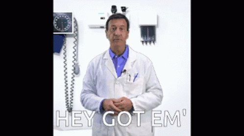 Doctor in Lab Coat Saying Hey Got Em