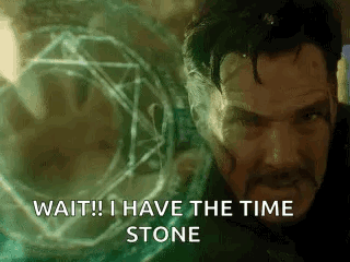 Doctor Strange Is Standing In Front Of A Glowing Object And Says `` Wait ! I Have The Time Stone '' . GIF
