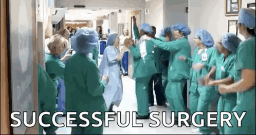 Doctors and Nurses Celebrating Successful Surgery