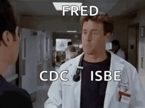 Doctors Talking in Hospital Corridor