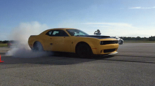Yellow Dodge Smoking GIF