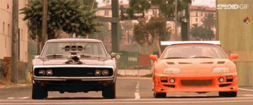 Dodge Charger and Toyota Supra Parked Side by Side