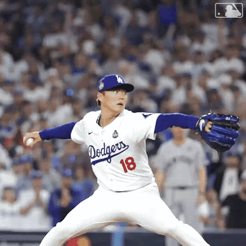 Dodgers Pitcher Throwing Baseball