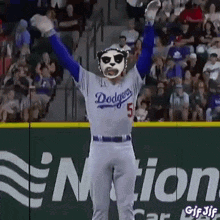 Dodgers Player in Panda Mask Raising Arms