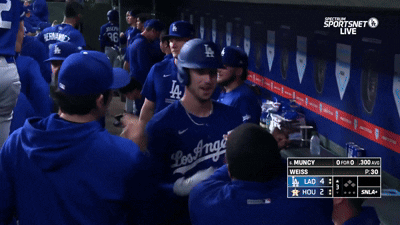 Dodgers Players Huddle in Dugout