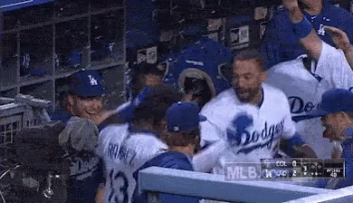 Dodgers Players Sitting In Dugout GIF