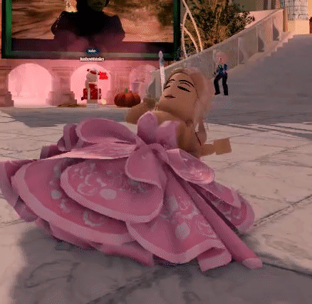 Doll In Pink Dress Sitting GIF