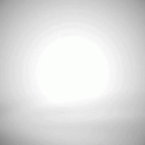 Doll Waving While Riding Wrecking Ball GIF