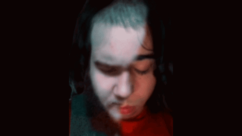Doll with Pins on Face and Neck