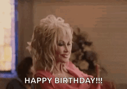 Dolly Parton in Pink Dress Saying Happy Birthday