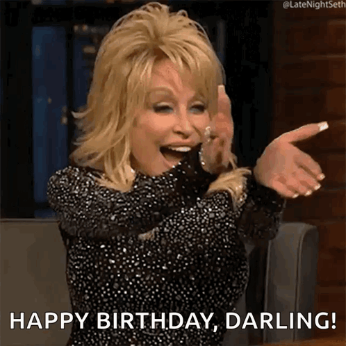 dolly parton is wearing a black sequined dress and laughing while saying happy birthday darling .