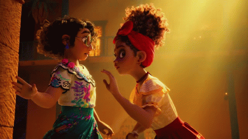 Dolores Madrigal Whispers To Mirabel GIF