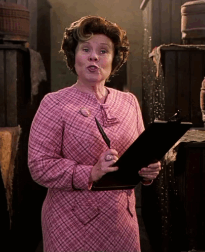 Dolores Umbridge Holding Checklist GIF