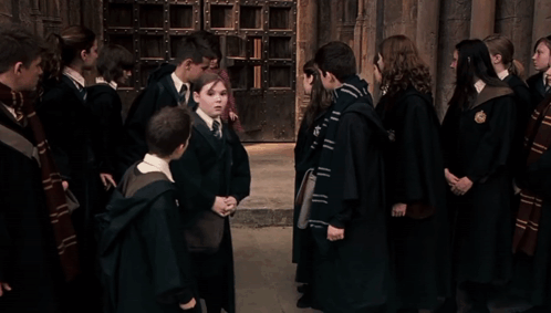 Dolores Umbridge Walking Through Students GIF