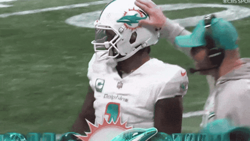 Dolphins Football Player Talking To Coach On Sideline GIF