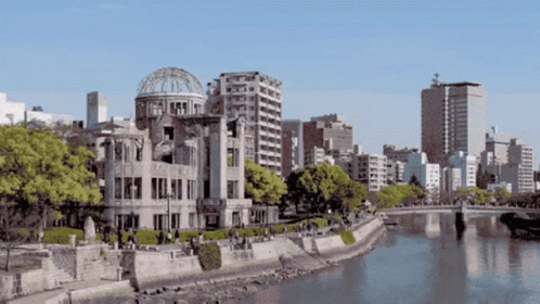 Domed Building Beside River In City GIF