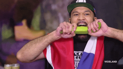Dominican American The Kid Mero Biting Banana GIF