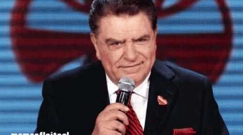 Don Francisco Holding Microphone GIF