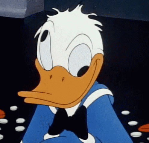 donald duck is wearing a blue shirt and a bow tie