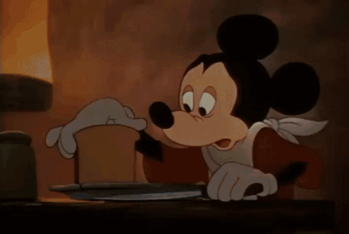 Donald Duck Sitting At Table With Food GIF