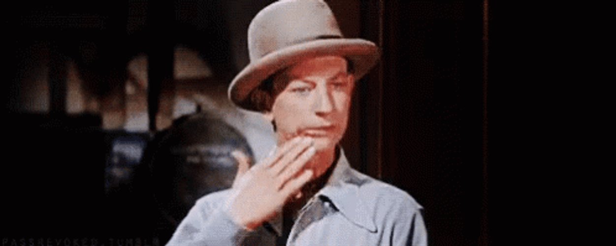 Donald O'Connor Funny Faces Singing In The Rain GIF