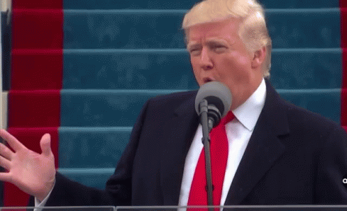 Donald Trump Giving Speech at Microphone