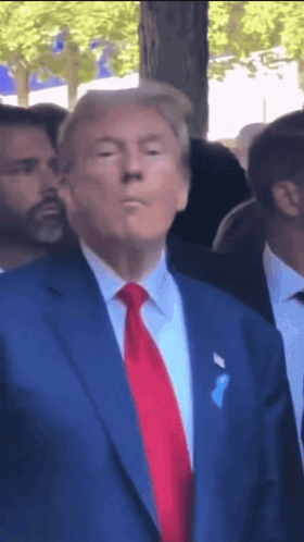 Donald Trump in Blue Suit and Red Tie