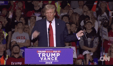 Donald Trump Is Giving A Speech At A Podium That Says Trump Will Fix It Trump Vance GIF