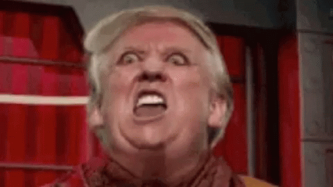 Donald Trump Is Making A Funny Face With His Mouth Open In A Close Up Of His Face . GIF
