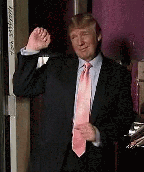 Donald Trump Is Wearing A Suit And A Pink Tie And Giving A Thumbs Up . GIF