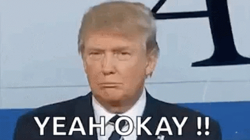 Donald Trump Is Wearing A Suit And Tie And Is Making A Funny Face . GIF