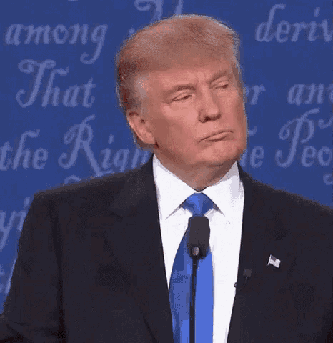 Donald Trump Making Funny Face Into Microphone GIF