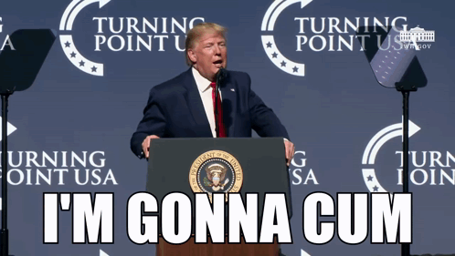 Donald Trump Stands At A Podium With A Sign That Says Turning Point Usa Behind Him GIF