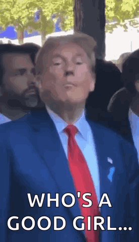 Donald Trump Wearing Blue Suit and Red Tie