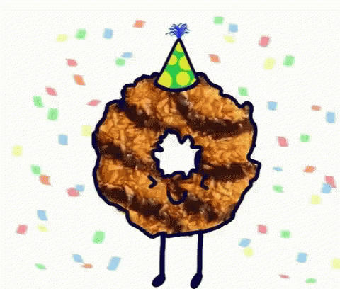 Donut With Arms and Legs Wearing Party Hat