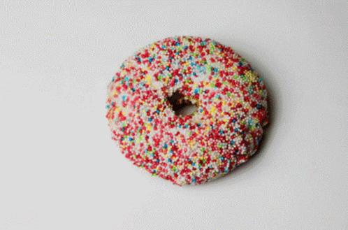 Donut with White Frosting and Sprinkles