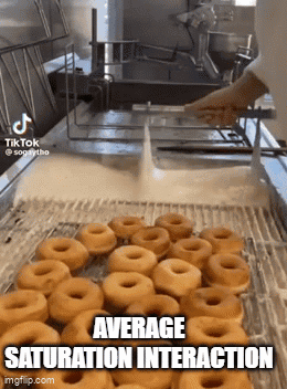 Donuts Being Cooked in Machine
